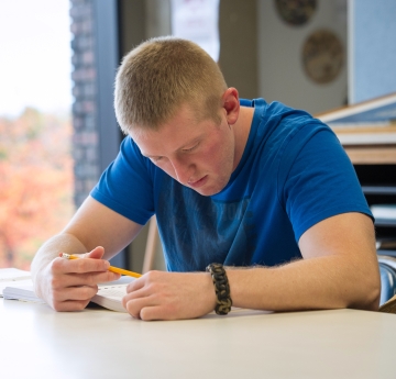 Student studying in the library